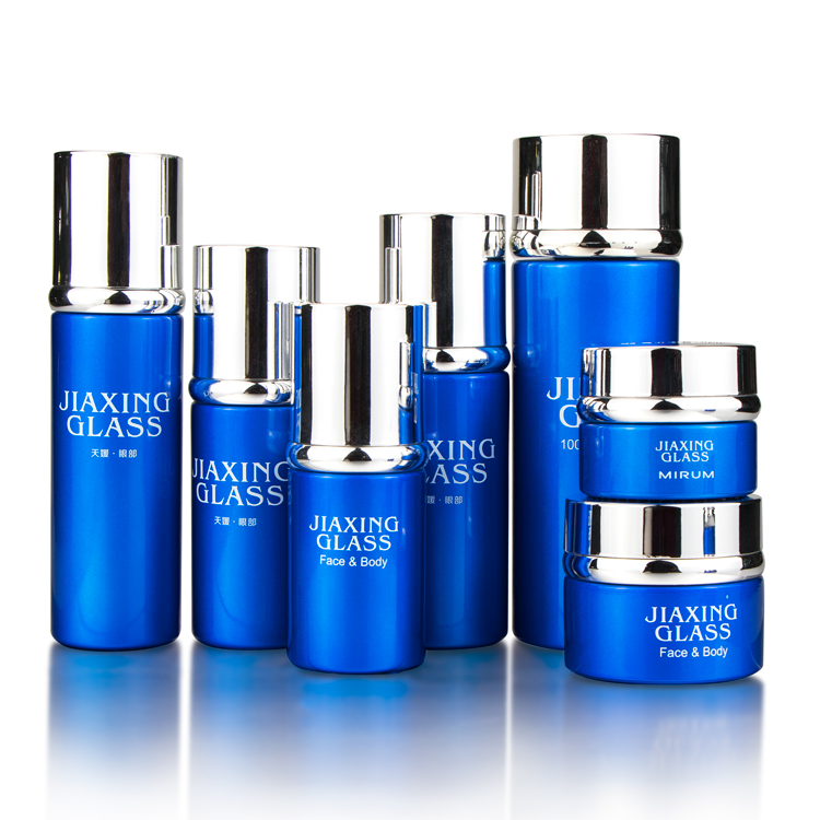 Wholesale 30 ml 1oz cream container blue cosmetic skincare lotion glass jar with silver lid