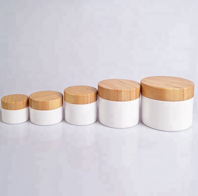 Wholesale 30g 50g 100g 150g 200g PP Cosmetic White Plastic cream jar with bamboo wooden lid for skin care