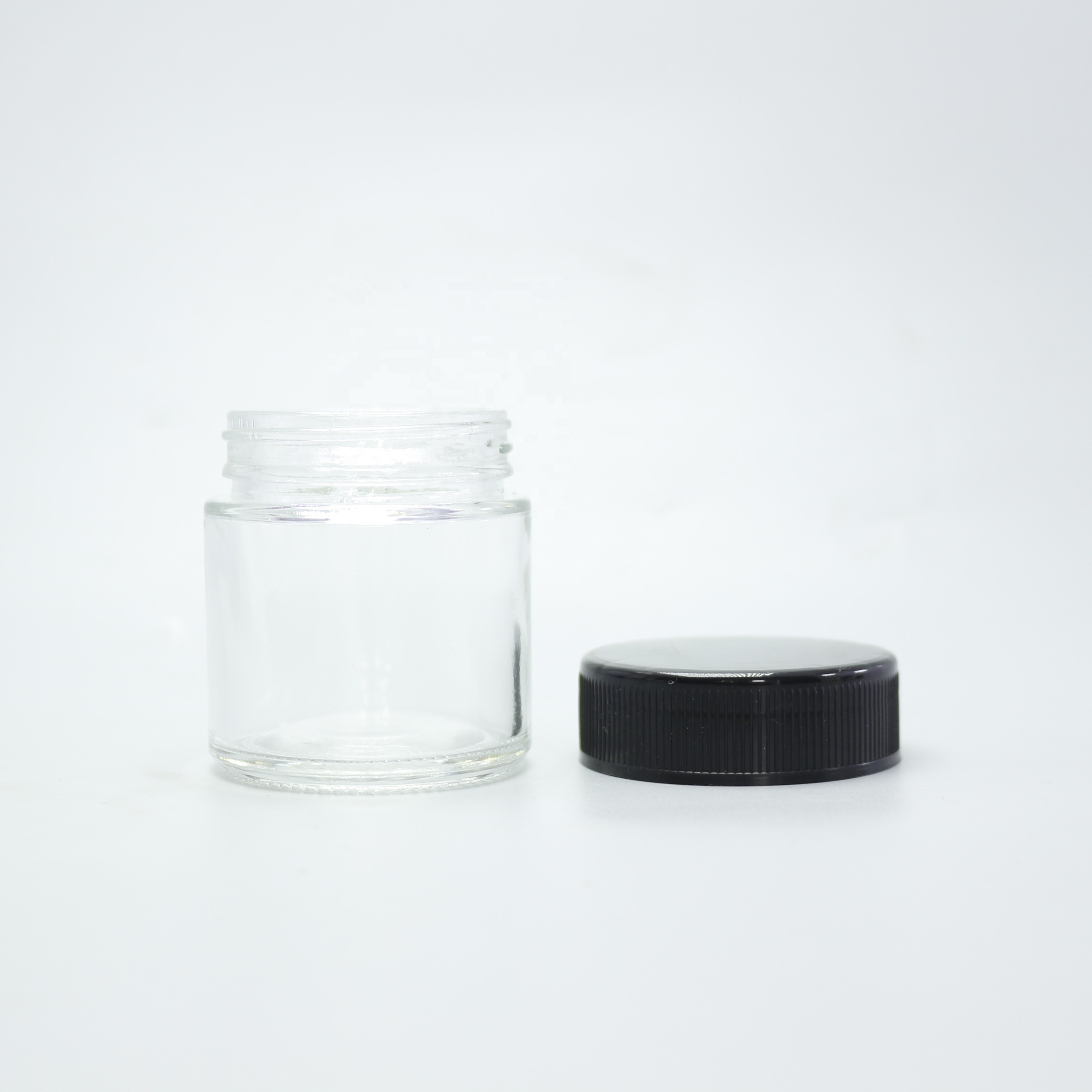 Wholesale 30g 50g 85g 110g child proof glass jar container with childproof cap CGJ-2T