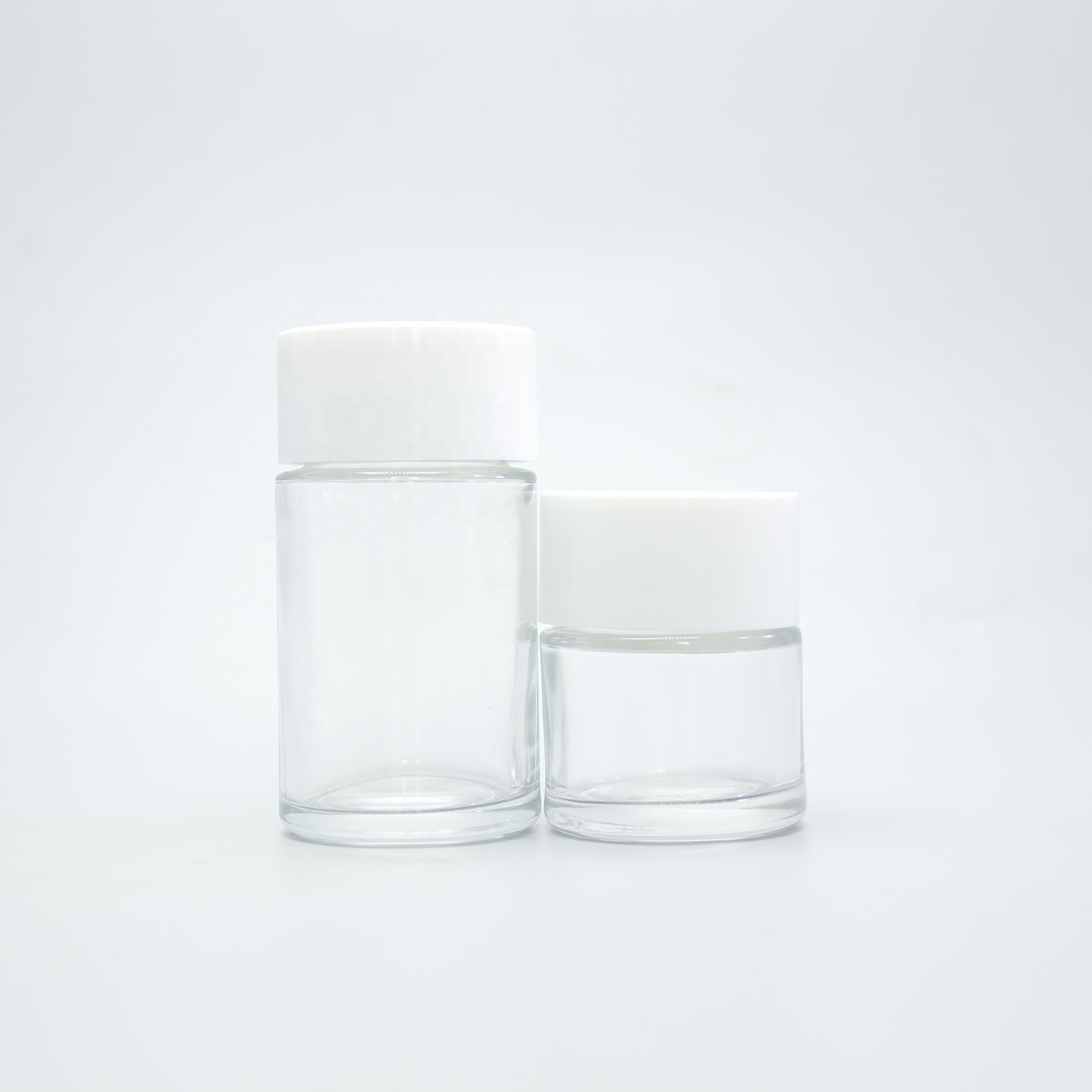 Wholesale 30g 50g 85g 110g child proof glass jar container with childproof cap CGJ-2T