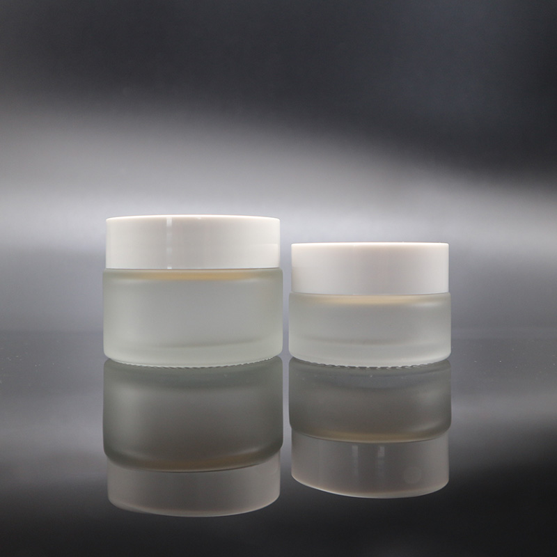 Wholesale 30g 50g clear frosted glass jar with white plastic lid