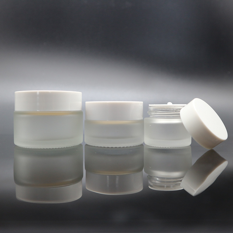 Wholesale 30g 50g clear frosted glass jar with white plastic lid