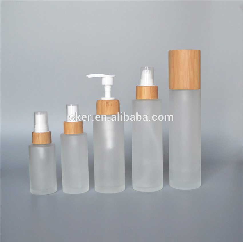 Wholesale 30g50g100g150g200g250g bamboo glass bottles only bamboo lids bamboo lotion spray pump cap