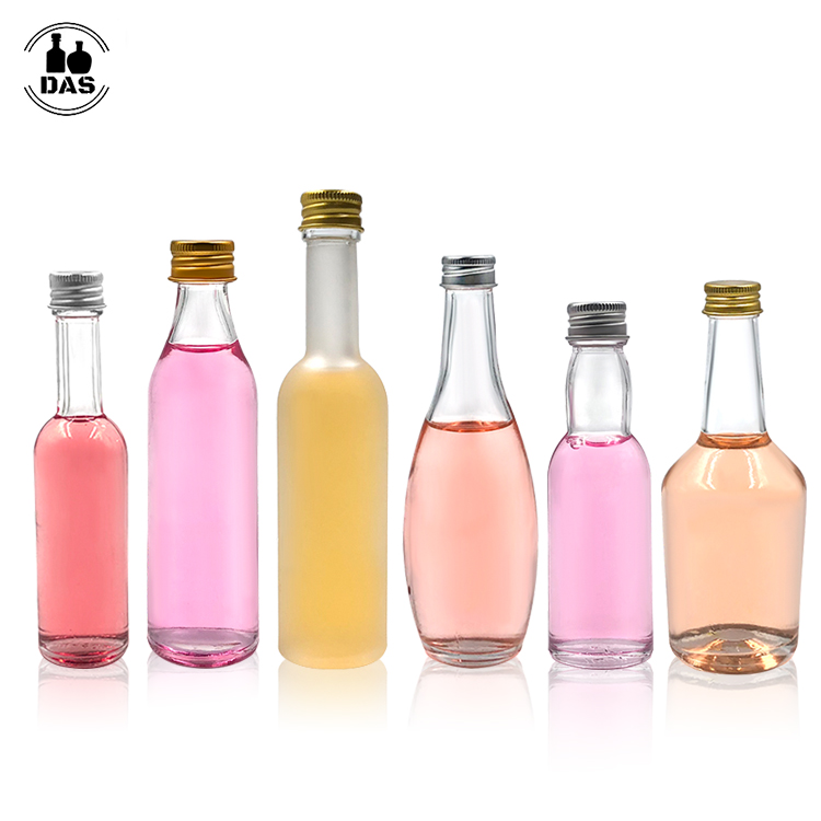 Wholesale 30ml 40ml 50ml 100ml Clear Frosted Mini Beverage Juice Coffee Wine Whisky Vodka Spirit Liquor Glass Bottle with Lids