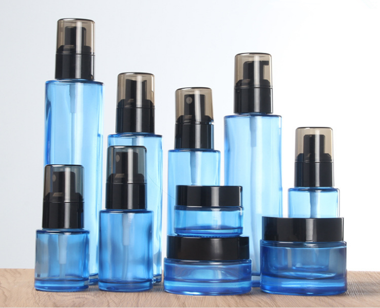 Wholesale 30ml 50ml 100ml transparent blue color Cosmetic packing bottle set bottle cream container for luxury skin care