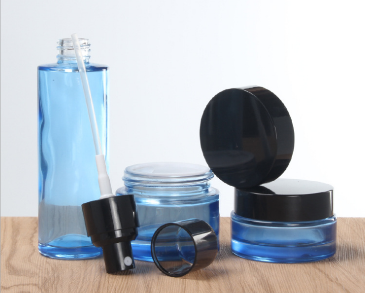 Wholesale 30ml 50ml 100ml transparent blue color Cosmetic packing bottle set bottle cream container for luxury skin care