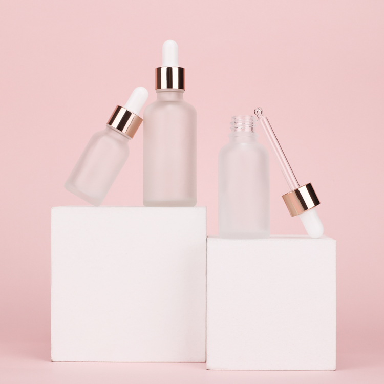 Wholesale 30ml clear frosted makeup skincare serum push button pump dropper glass bottle with push dropper