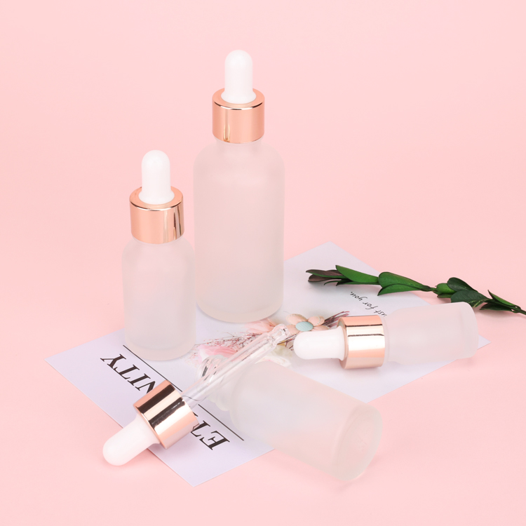 Wholesale 30ml clear frosted makeup skincare serum push button pump dropper glass bottle with push dropper