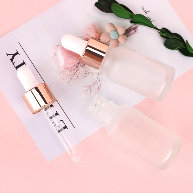 Wholesale 30ml clear frosted makeup skincare serum push button pump dropper glass bottle with push dropper