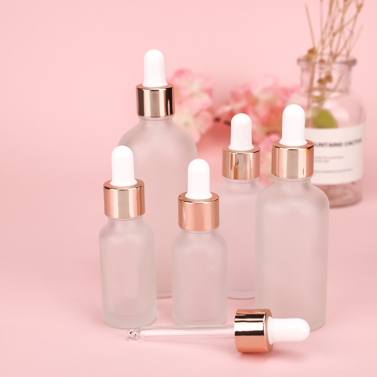 Wholesale 30ml clear frosted makeup skincare serum push button pump dropper glass bottle with push dropper