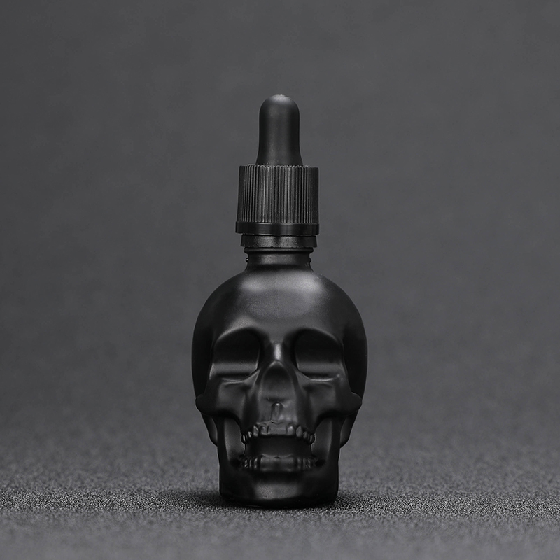 Wholesale 30ml skull shape glass dropper bottle for e juice with child proof dropper 30ml 60ml