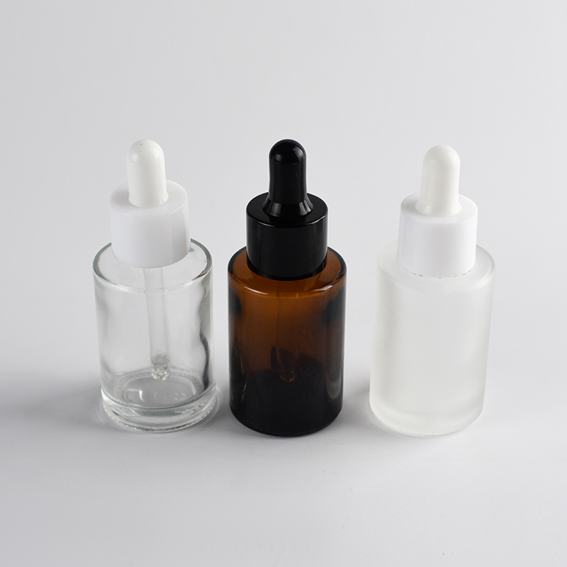 Wholesale 30ml transparent cosmetic flat shoulder eye serum dropper glass bottle set with gold dropper lid