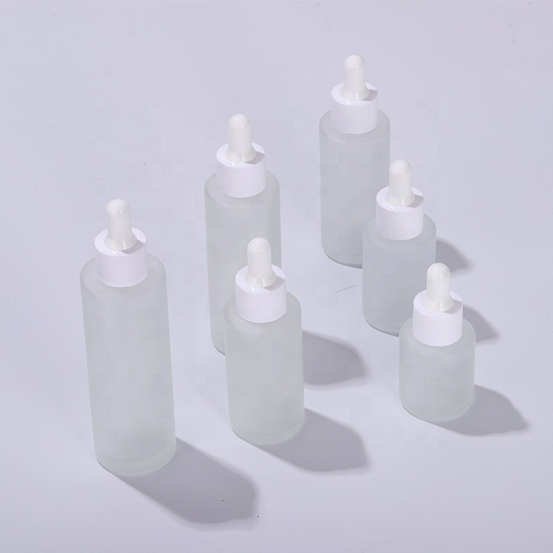 Wholesale 30ml transparent matte cosmetic flat shoulder eye serum dropper glass bottle set with white dropper lid
