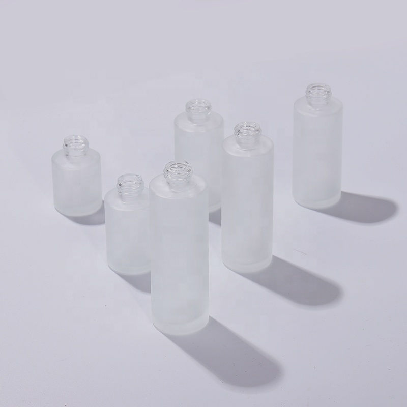 Wholesale 30ml transparent matte cosmetic flat shoulder eye serum dropper glass bottle set with white dropper lid