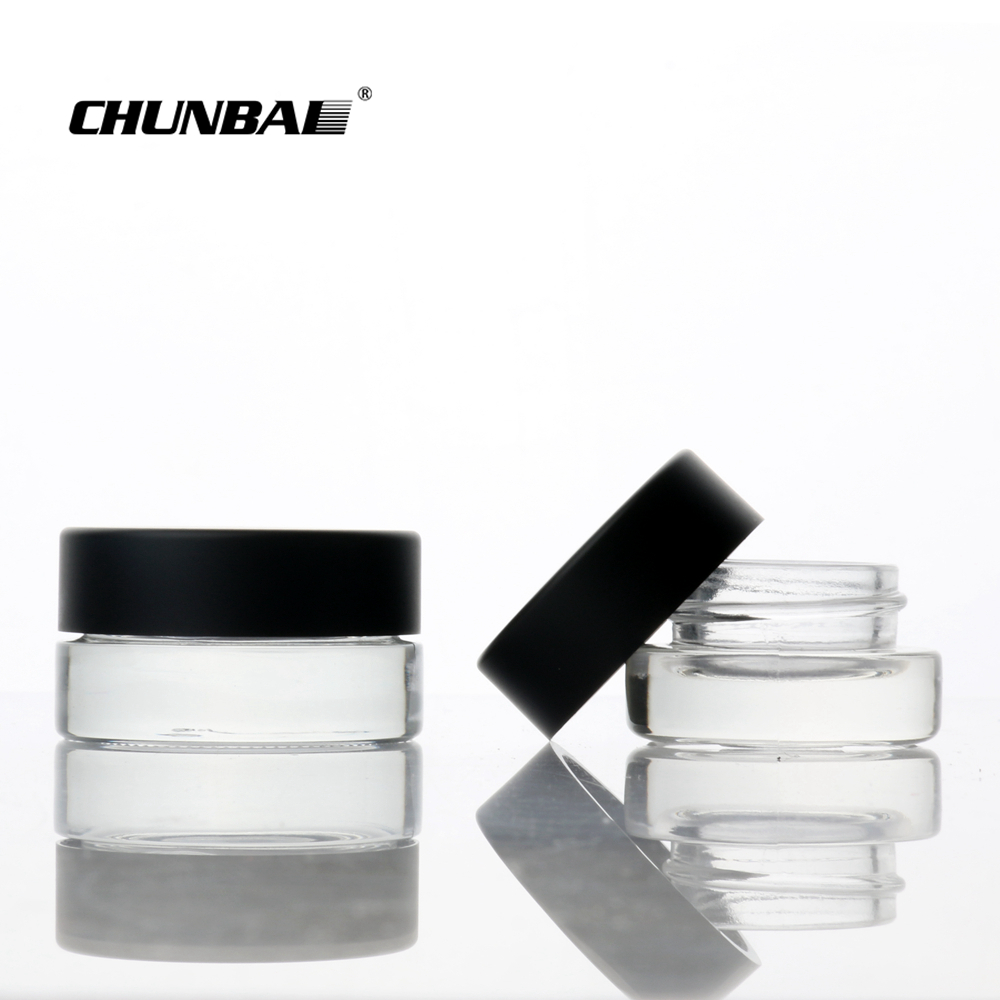 Wholesale 3g 5g small round glass bottle jars childproof glass jar food grade glass jars