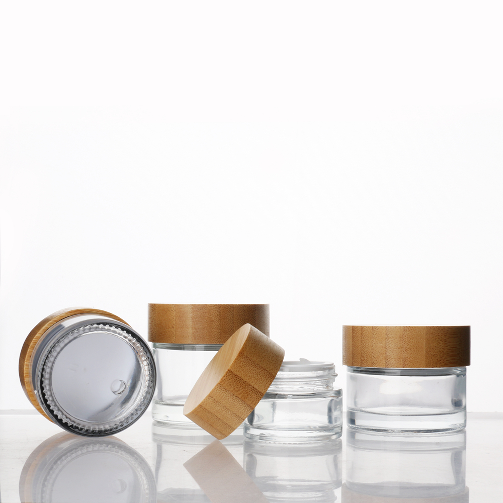 Wholesale 3g 5g small round glass bottle jars childproof glass jar food grade glass jars