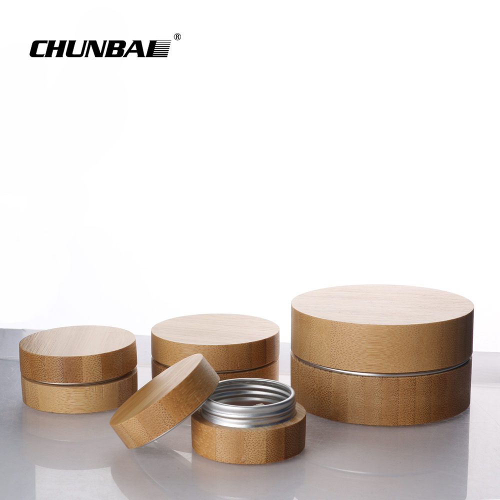 Wholesale 3g 5g small round glass bottle jars childproof glass jar food grade glass jars