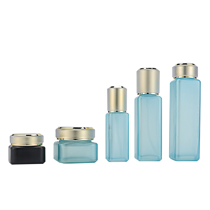 Wholesale 40ml 100ml 150ml 30g 50g Blue Square Cosmetic Packaging Cosmetic Glass Bottle Cream Jar with Gold Lid for Skin Care
