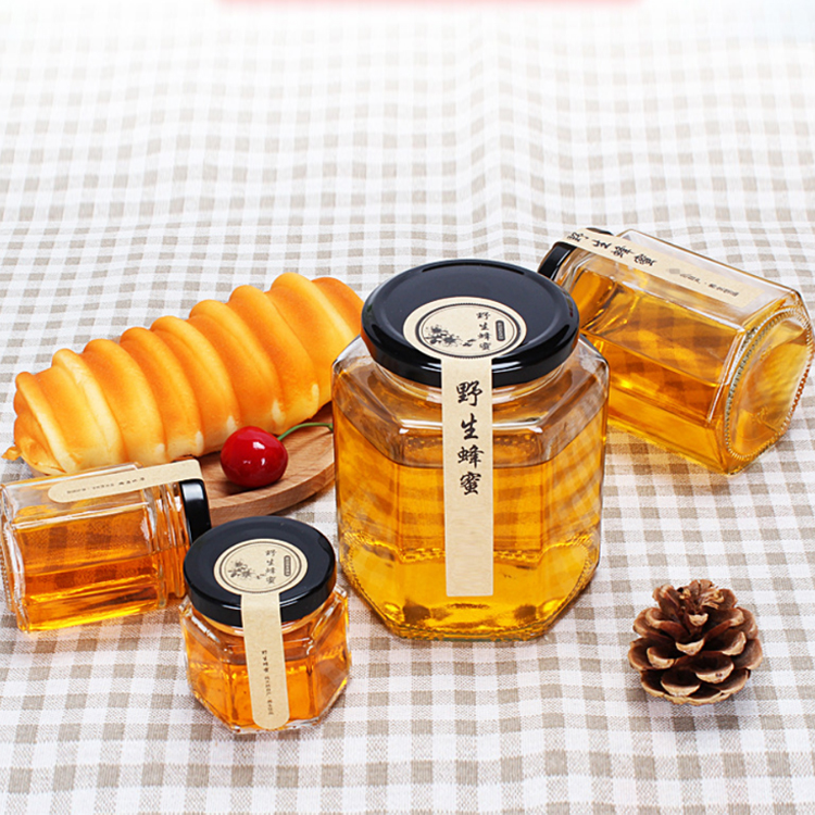 Wholesale 45ml 85ml 100ml 180ml 280ml 380ml 500ml 730ml Hexagonal Glass Honey Jar With Lids