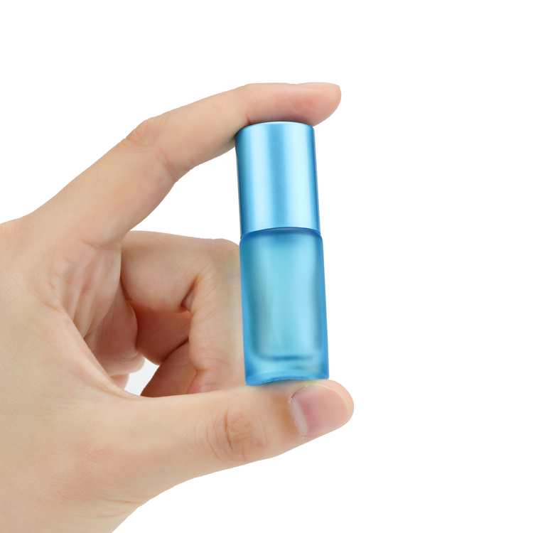 Wholesale 4ml 6ml 8ml 10ml clear amber green blue roll on glass bottle with steel ball for eye cream or perfume oil