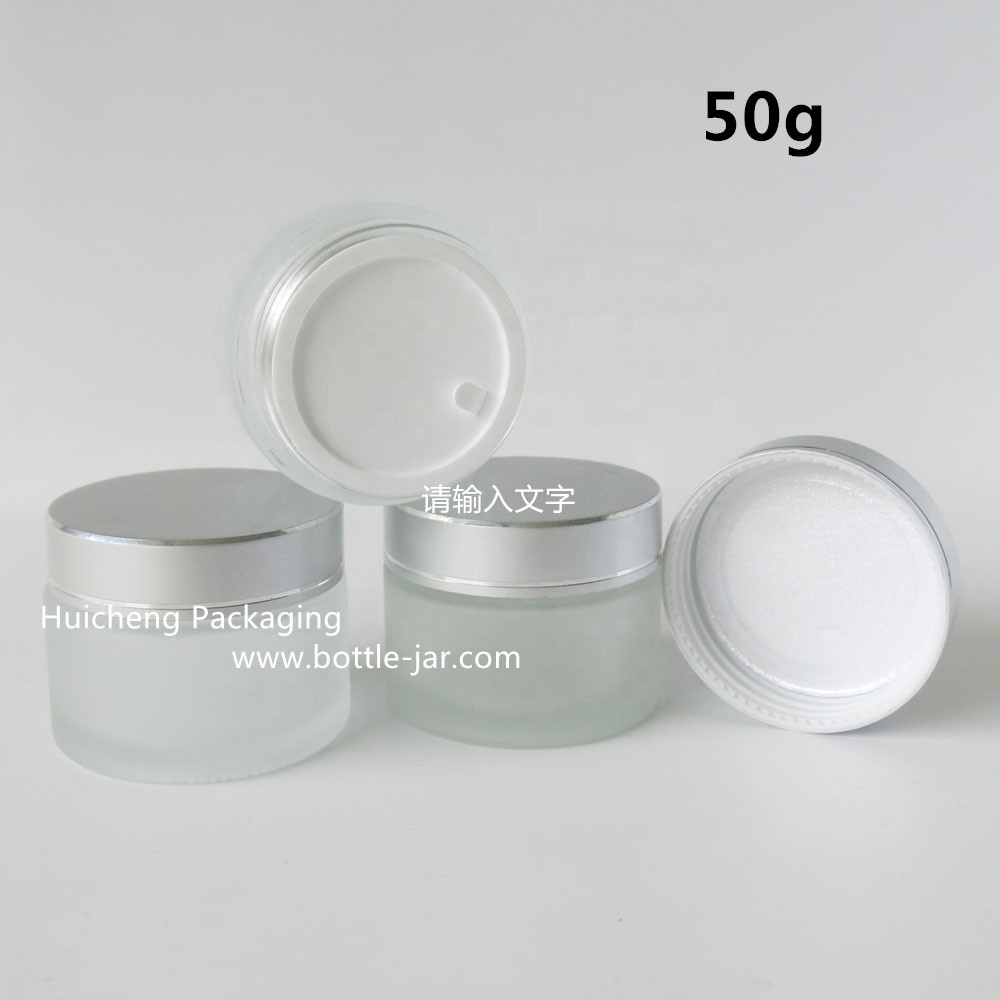 Wholesale 50 g frosted glass cosmetic jar with sliver cap