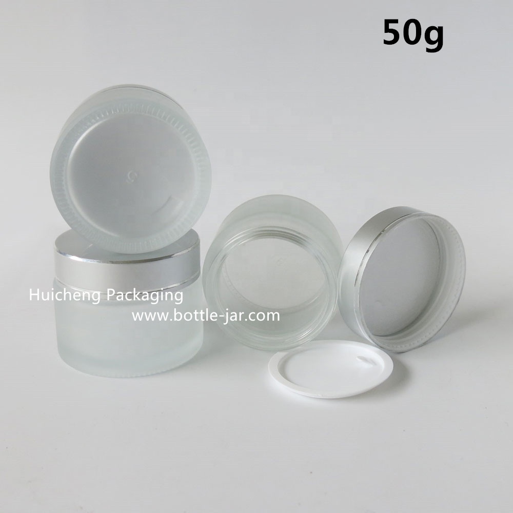 Wholesale 50 g frosted glass cosmetic jar with sliver cap