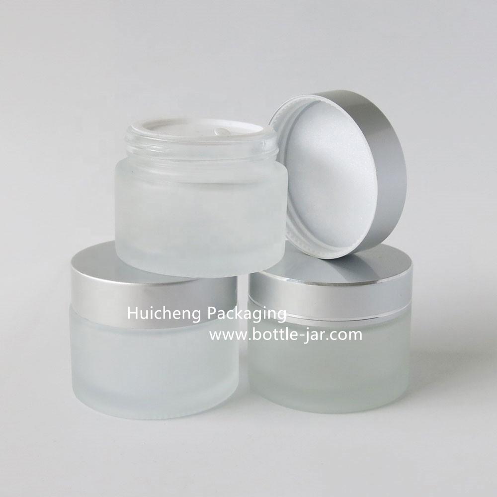Wholesale 50 g frosted glass cosmetic jar with sliver cap