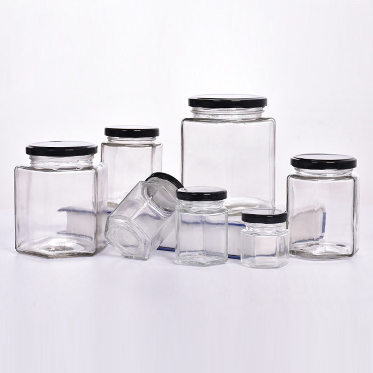 Wholesale  500g 1000g hexagon honey glass jar with metal closure lid honey jars glass hexagonal