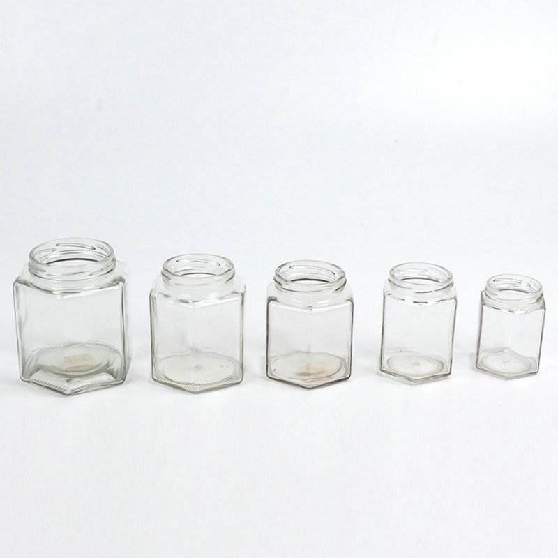 Wholesale 500g 1000g hexagon honey glass jar with metal closure lid honey jars glass hexagonal