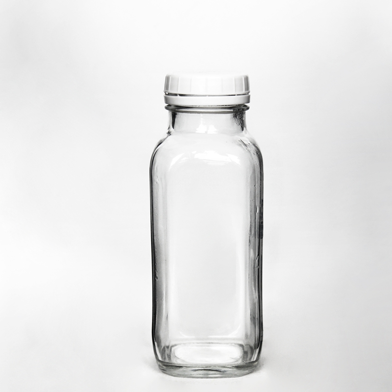 Wholesale 500ml Empty Carbonated Beverage Cold Pressing Juice Milk Tea Glass Bottles With Tamper Evident Lid