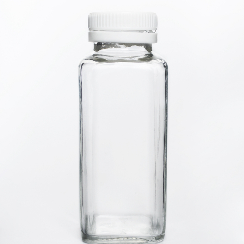 Wholesale 500ml Empty Carbonated Beverage Cold Pressing Juice Milk Tea Glass Bottles With Tamper Evident Lid