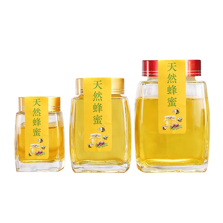 Wholesale 500ml unique clear hexagonal glass honey jar with screw cap