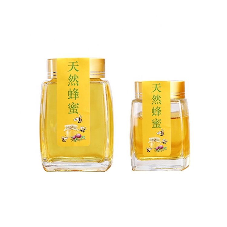 Wholesale 500ml unique clear hexagonal glass honey jar with screw cap