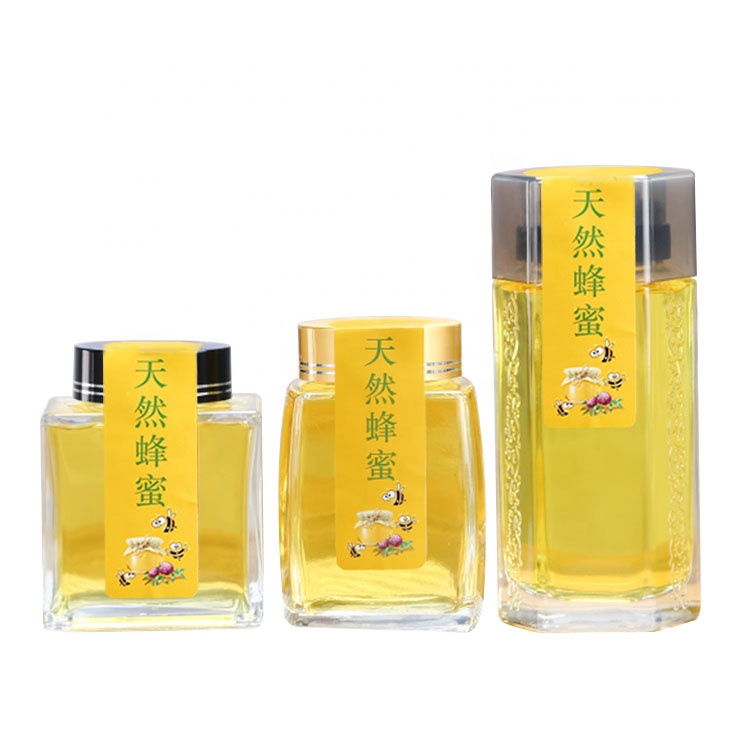 Wholesale 500ml unique clear hexagonal glass honey jar with screw cap