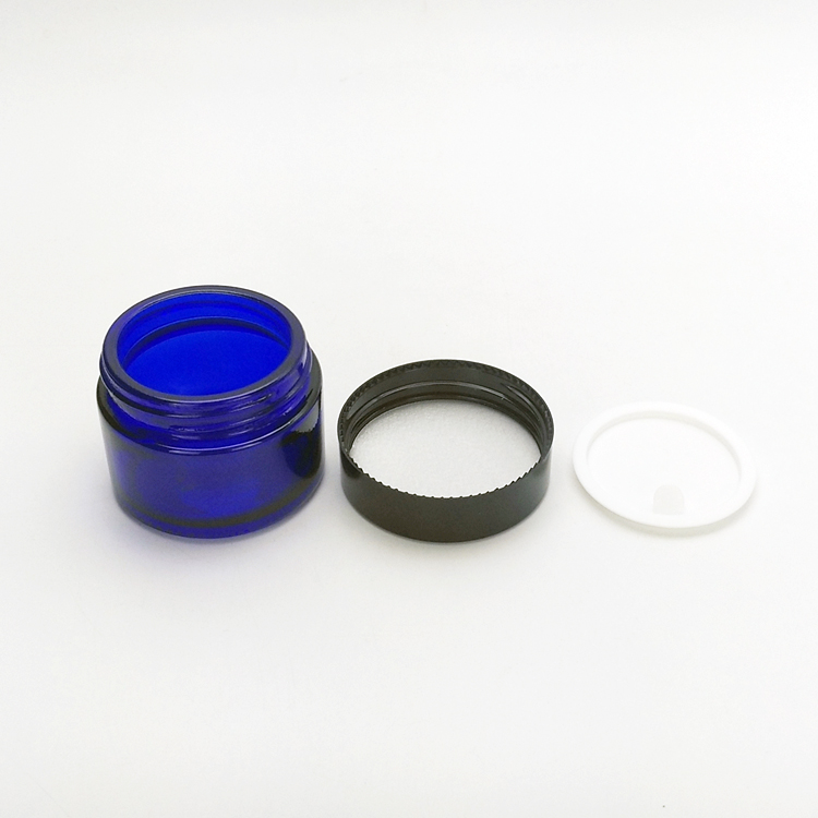 Wholesale 50g blue color empty glass cosmetic jar with plastic lid and gasket