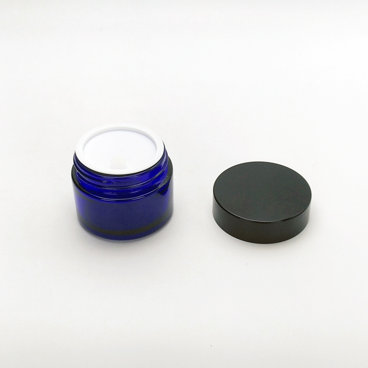 Wholesale 50g blue color empty glass cosmetic jar with plastic lid and gasket