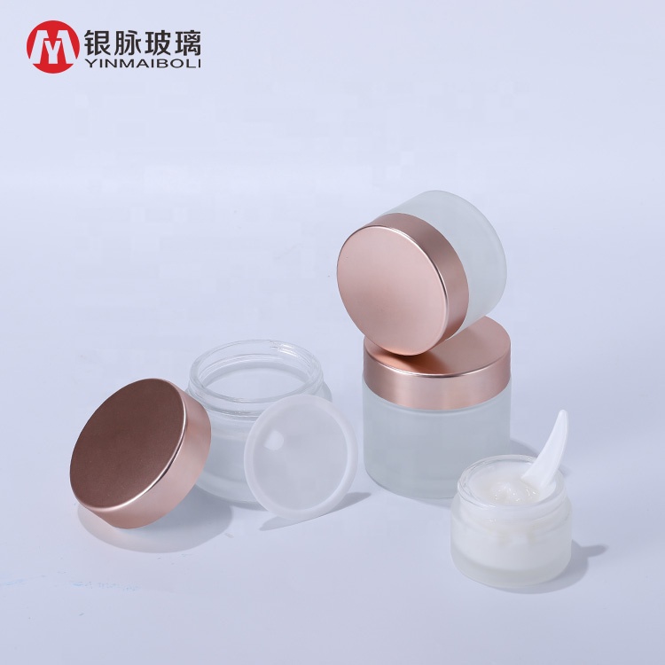 Wholesale 50g cosmetic jar clear glass cream jar with rose gold lid eco friendly cosmetic containers