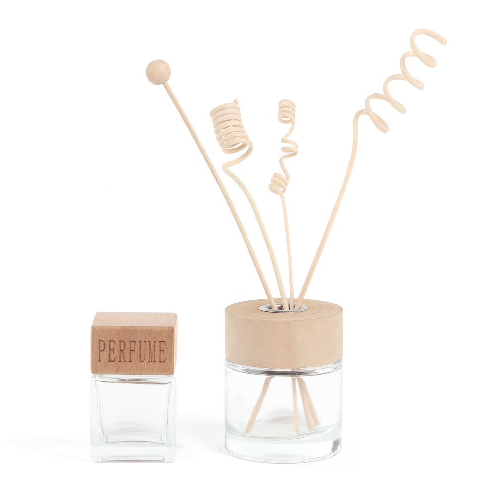 Wholesale 50ml 100ml 200ml round arometic glass diffuser glass bottle with wooden cap