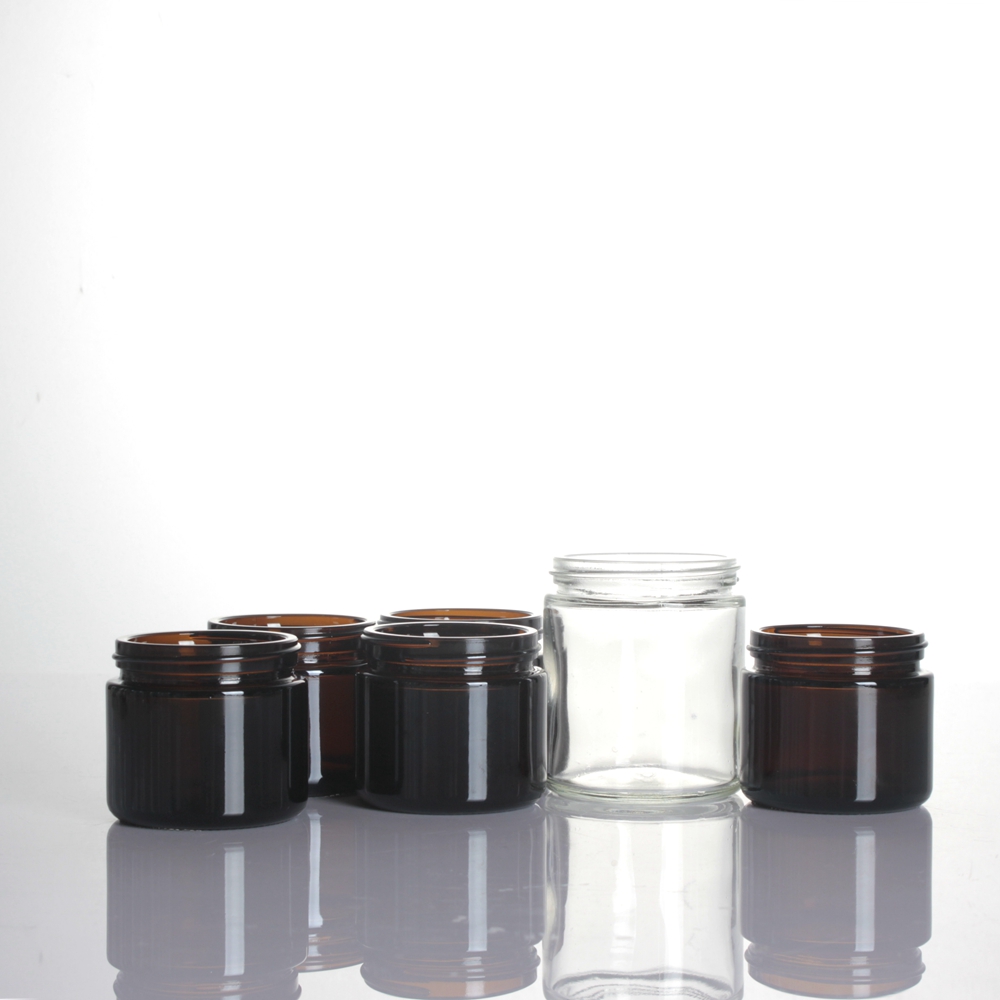 Wholesale 50ml 100ml 2oz 3oz 200ml amber eye cream clear candle holder bath salts glass jar with aluminum metal plastic cap