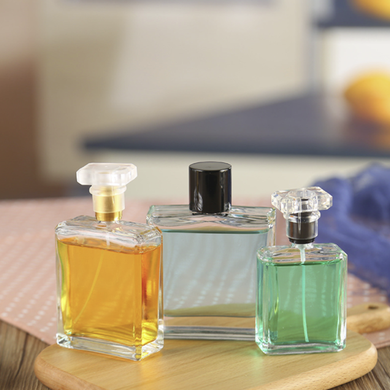 Wholesale 50ml 100ml perfume bottle luxury glass square spray bottle with acrylic top for perfume