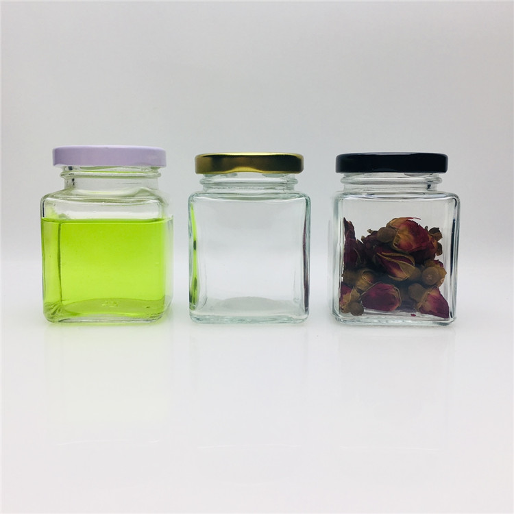 Wholesale 50ml 100ml square empty glass lucid bottle jar for candy sweets Food use