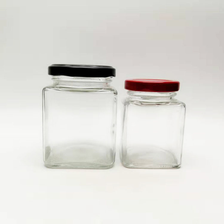 Wholesale 50ml 100ml square empty glass lucid bottle jar for candy sweets Food use