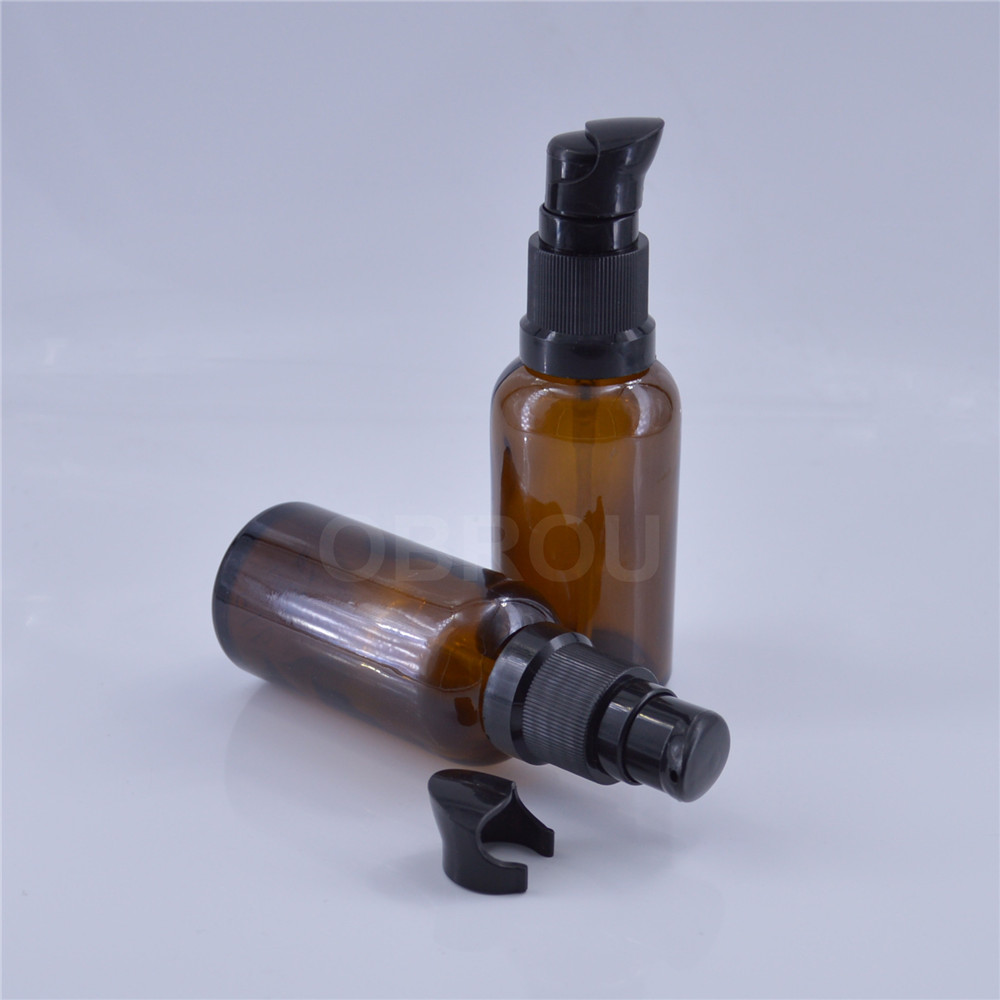 Wholesale 50ml 30ml 20 ml pump lotion bottle amber press serum pump glass bottle for skin care cream