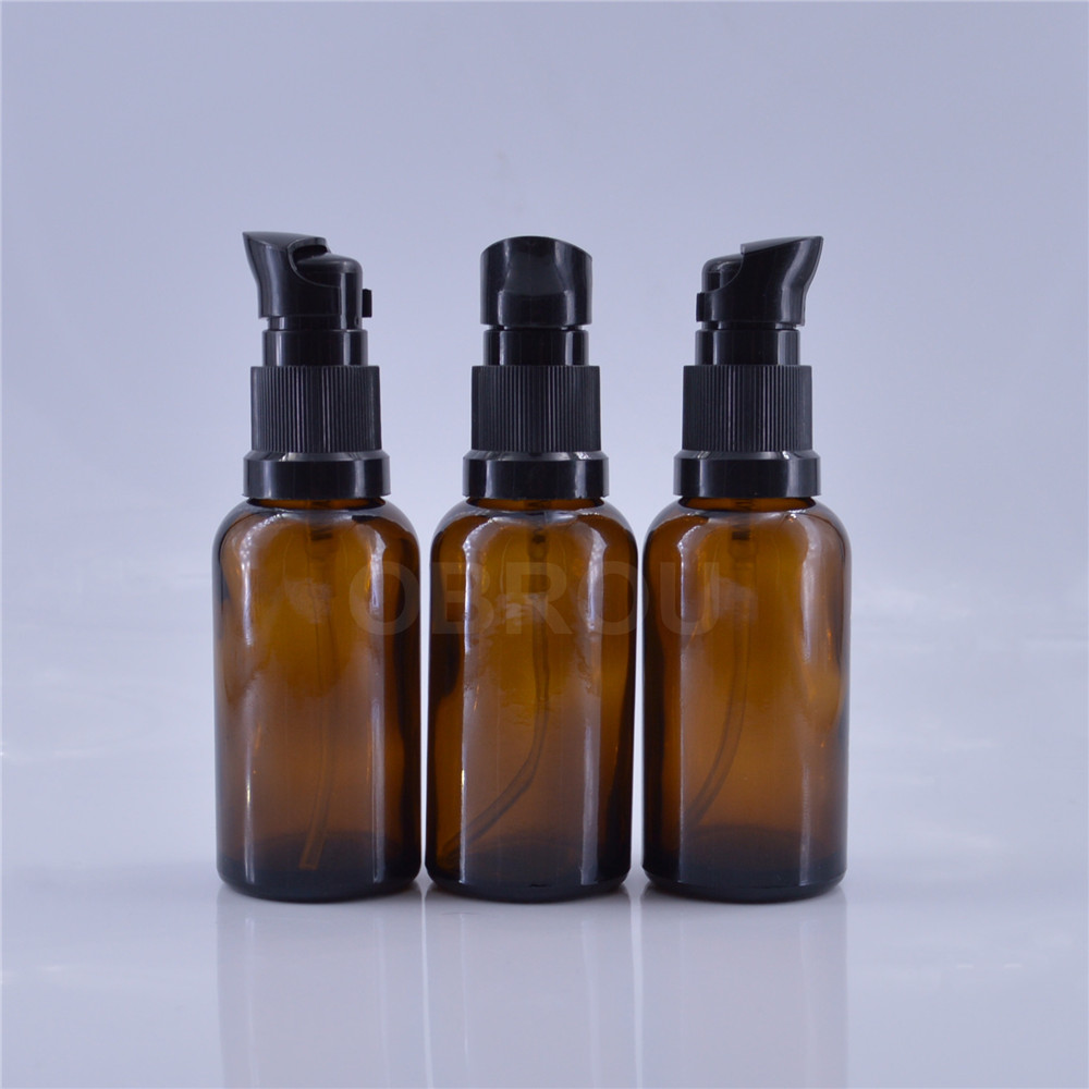 Wholesale 50ml 30ml 20 ml pump lotion bottle amber press serum pump glass bottle for skin care cream