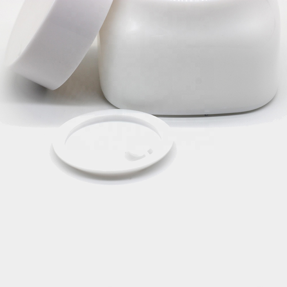 Wholesale 50ml Ceramic Cosmetic Cream Packaging Slanted Shoulder Empty Glass Jar With PP Lid