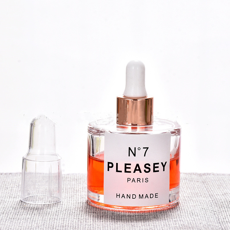 Wholesale 50ml clear glass wide round dropper bottle with gold rose dropper and Silica gel cap for essence oil bottles