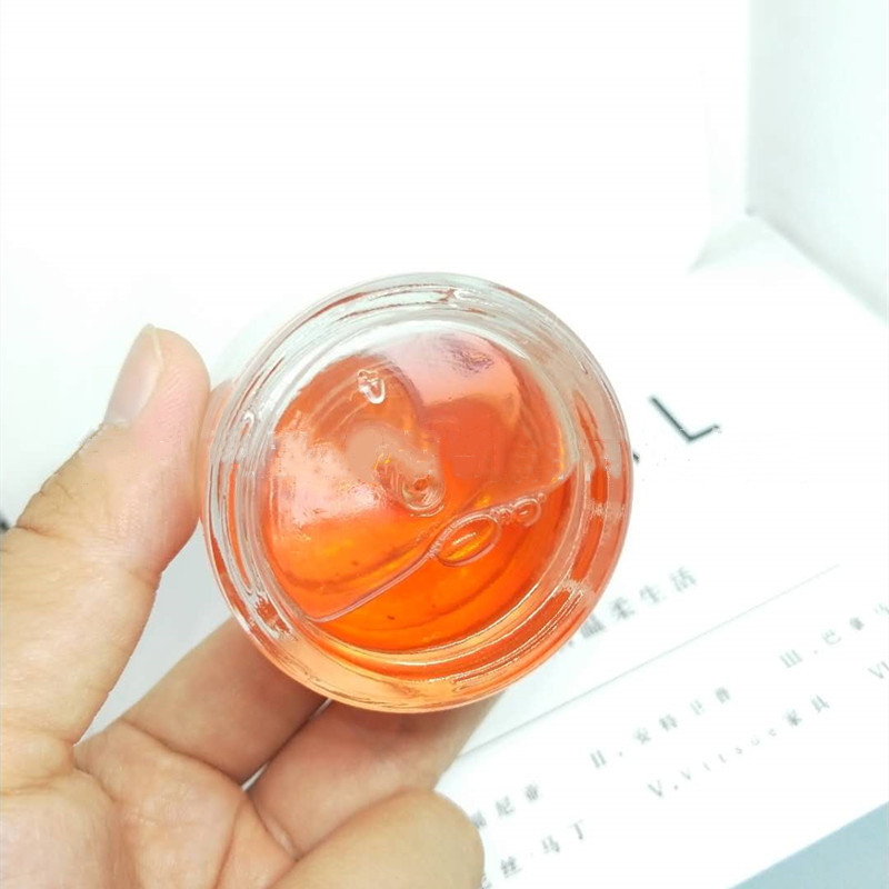 Wholesale 50ml clear glass wide round dropper bottle with gold rose dropper and Silica gel cap for essence oil bottles