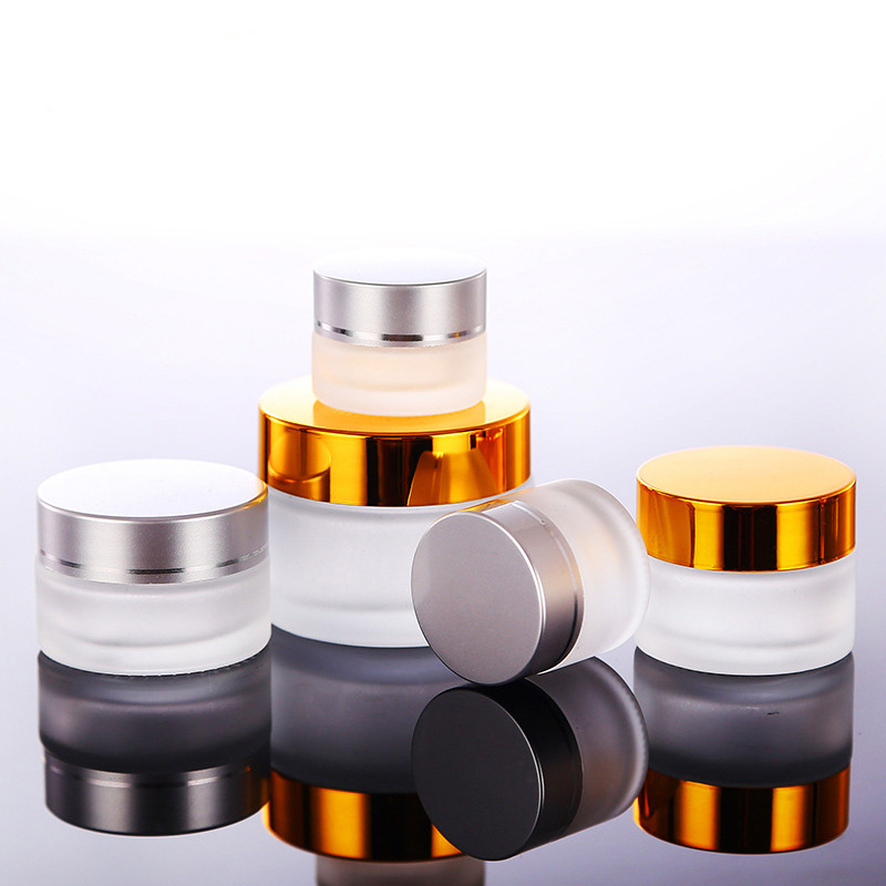 Wholesale 5g 10g 15g 20g 30g 50g 100g frosted clear glass cream jars empty glass bottles for cosmetic cream with aluminum lids