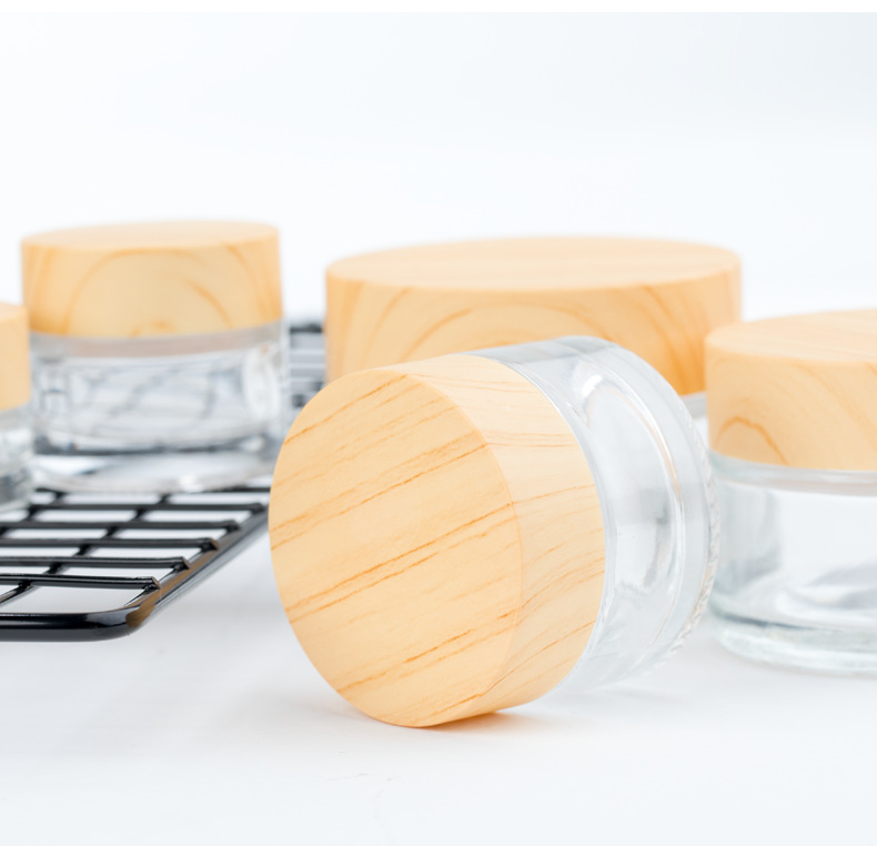 Wholesale 5g 5ml Small Cosmetic Frosted Clear Glass Cream Jar With Wood Lid
