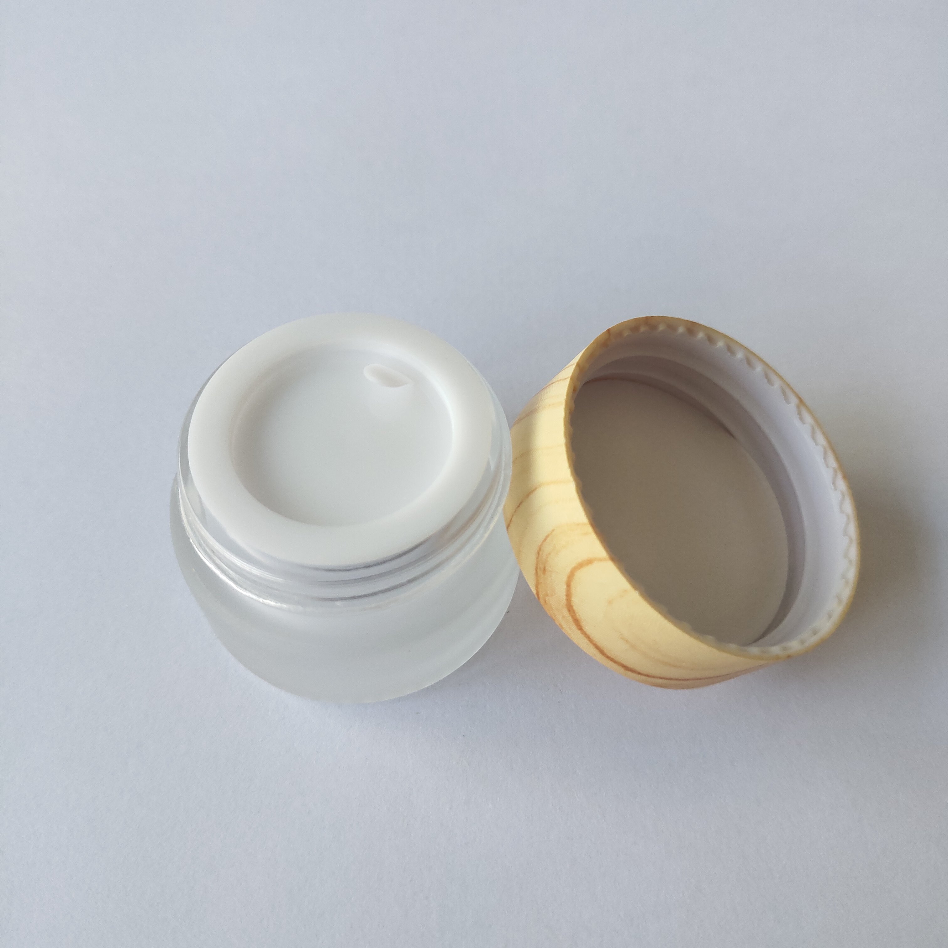 Wholesale 5g 5ml Small Cosmetic Frosted Clear Glass Cream Jar With Wood Lid